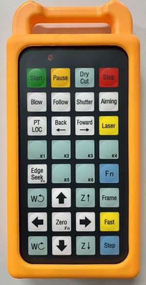 Photo d'une télécommande avec plein de boutons